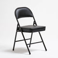 Chaise pliante aux lignes épurées, coloris noir